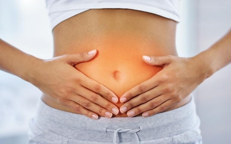 Healthy woman showing a belly.