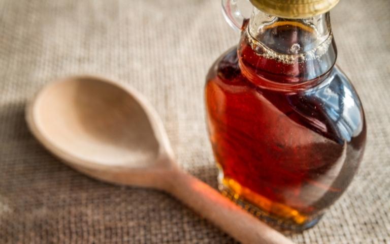 Maple syrup in a bottle.